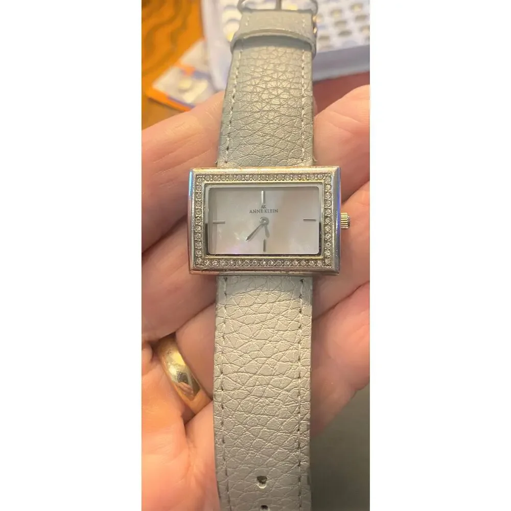 Women's Anne Klein Watch, Silver Tone with Rhinestone Accents, Pink MOP Face
